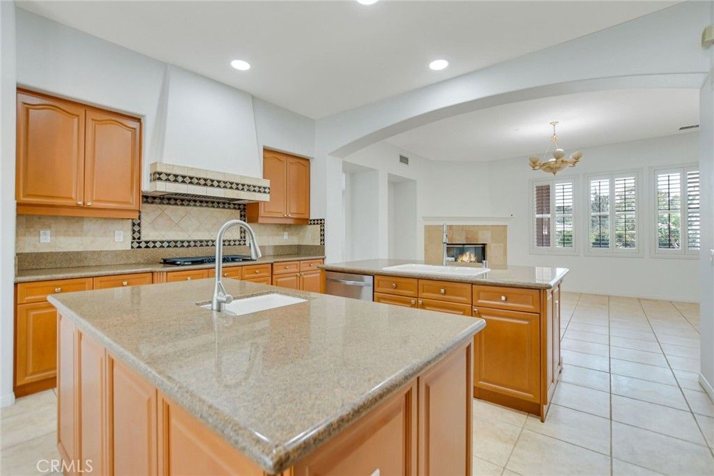 Chandelier, Fireplace, Interior, Kitchen, Recessed Lighting, Stainless Steel Appliances