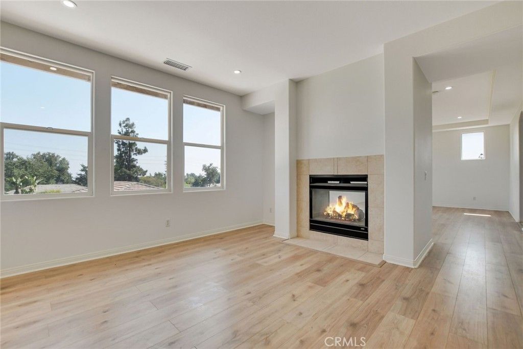 Empty room, Fireplace, Interior, Recessed Lighting, Wood Texture Flooring