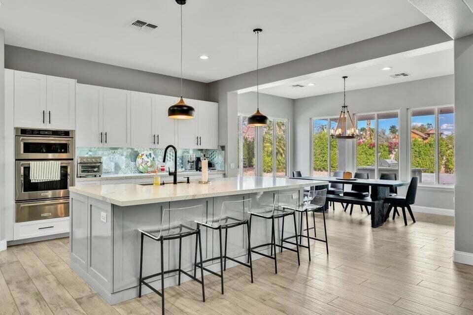 Dining room, Interior, Kitchen, Pendant Lights, Recessed Lighting, Stainless Steel Appliances, Wood Texture Flooring