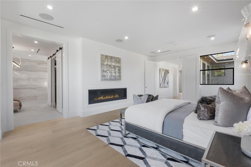 Bedroom, Fireplace, Interior, Pendant Lights, Recessed Lighting, Wood Texture Flooring