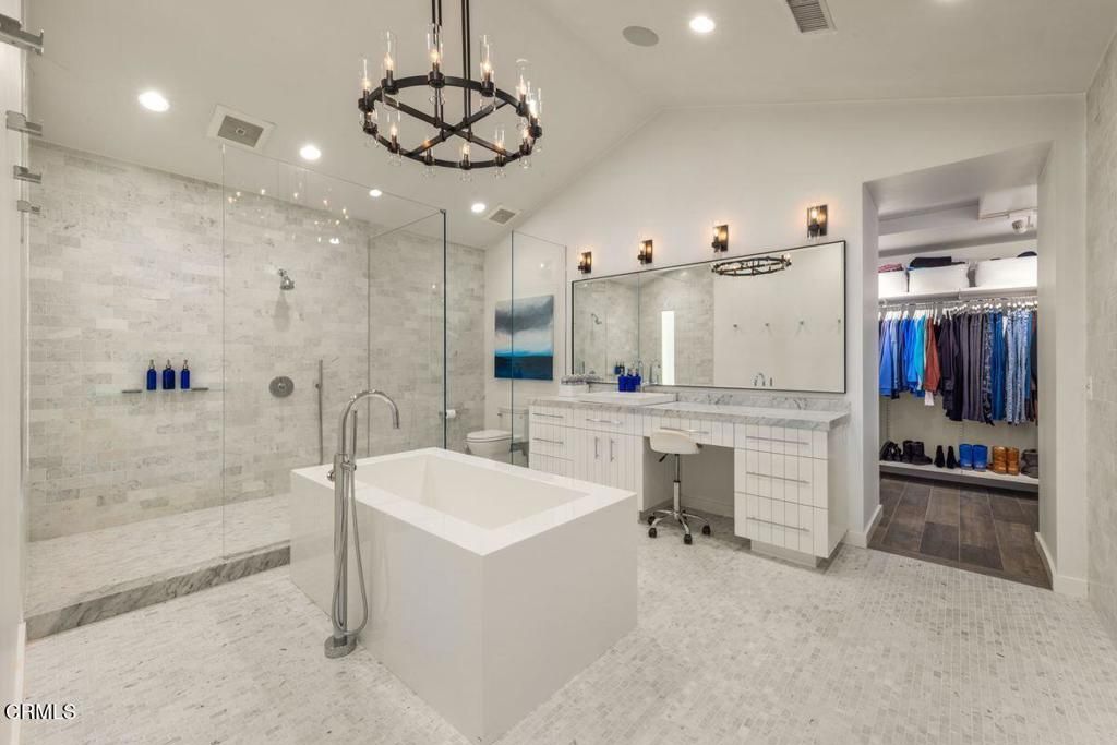 Bathroom, Chandelier, Dual Sink Vanities, Free Standing Baths, Glass Shower, Interior, Recessed Lighting, Walk-in Closets, Wood Texture Flooring