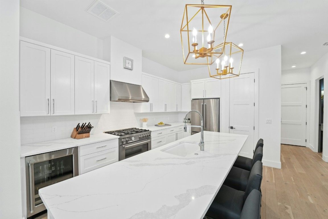 Interior, Kitchen, Pendant Lights, Recessed Lighting, Stainless Steel Appliances, Wood Texture Flooring