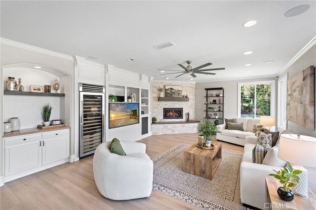 Fireplace, Interior, Living room, Recessed Lighting, Stone Walls, Wood Texture Flooring