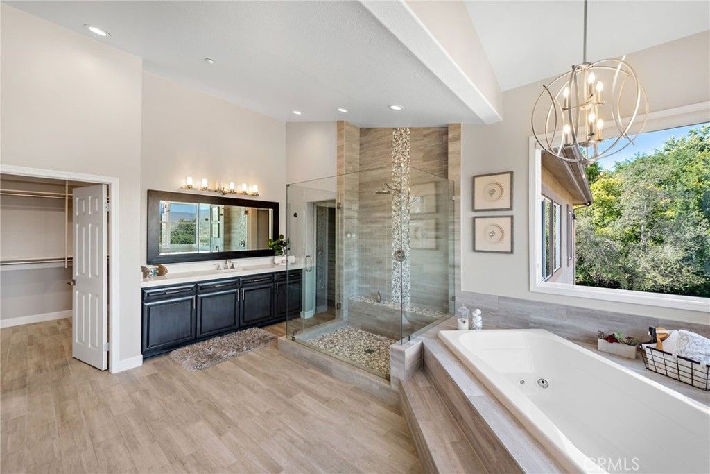 Bathroom, Chandelier, Glass Shower, Interior, Pendant Lights, Recessed Lighting, Wood Texture Flooring