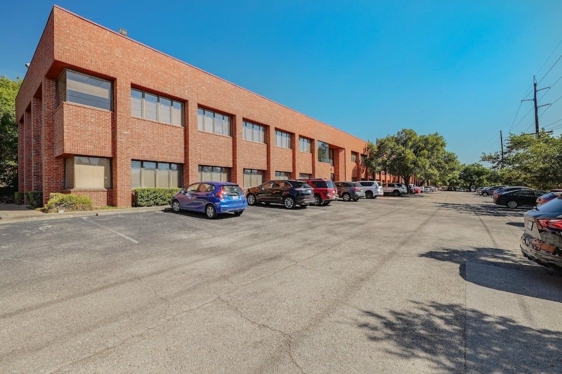 Exterior, Facade, Brick Facade, Condo Building