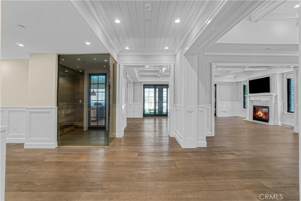 Empty room, Fireplace, Interior, Recessed Lighting, Wood Texture Flooring