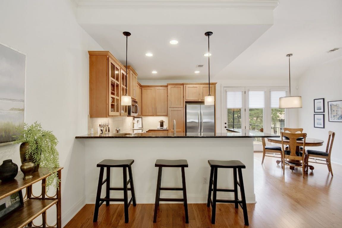 Dining room, Interior, Kitchen, Pendant Lights, Recessed Lighting, Stainless Steel Appliances, Wood Texture Flooring