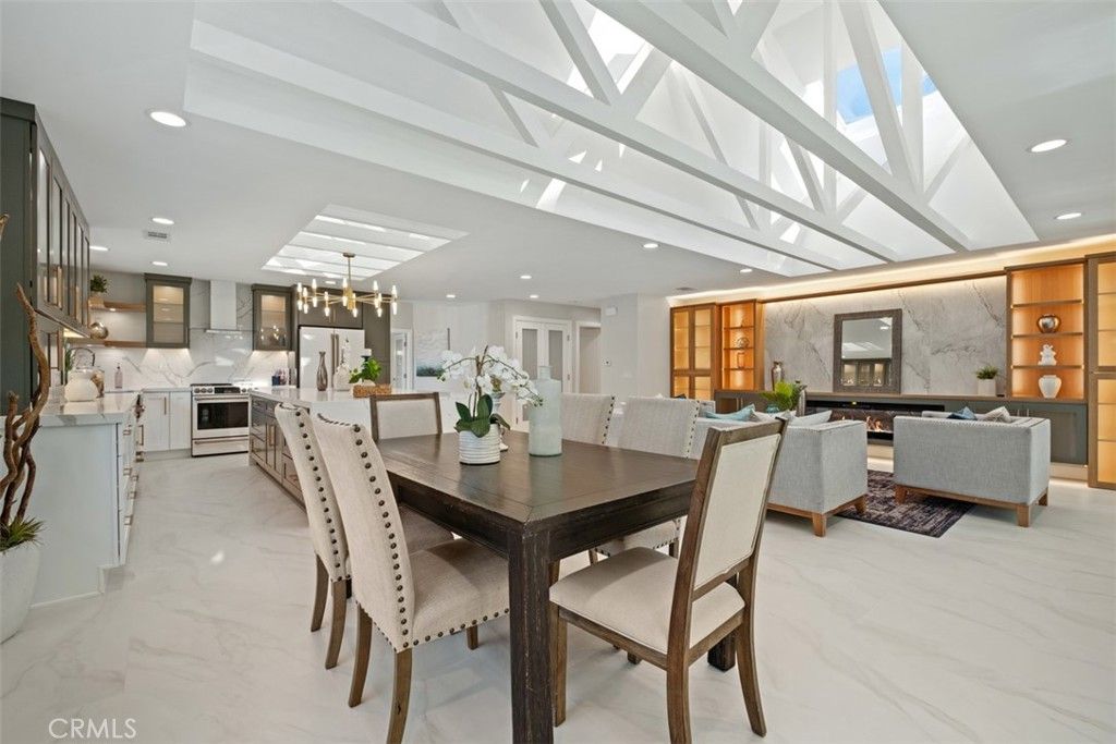 Dining room, Fireplace, Interior, Kitchen, Living room, Marble, Marble Walls, Pendant Lights, Recessed Lighting, Stainless Steel Appliances
