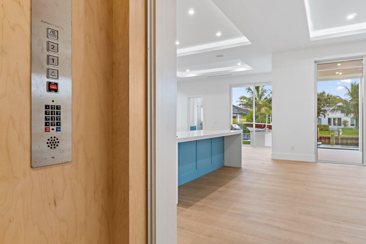 Elevator, Interior, Recessed Lighting, Wood Texture Flooring, Wooden Walls