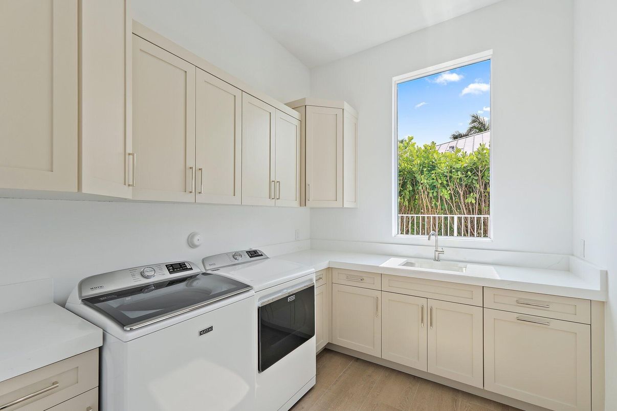 Interior, Kitchen, Recessed Lighting, Washer, Wood Texture Flooring