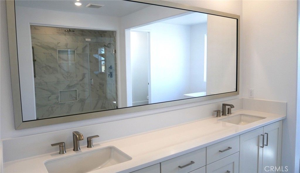 Bathroom, Dual Sink Vanities, Glass Shower, Interior, Marble Walls, Recessed Lighting