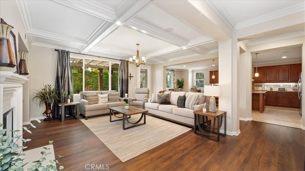 Chandelier, Fireplace, Interior, Living room, Pendant Lights, Recessed Lighting, Wood Texture Flooring