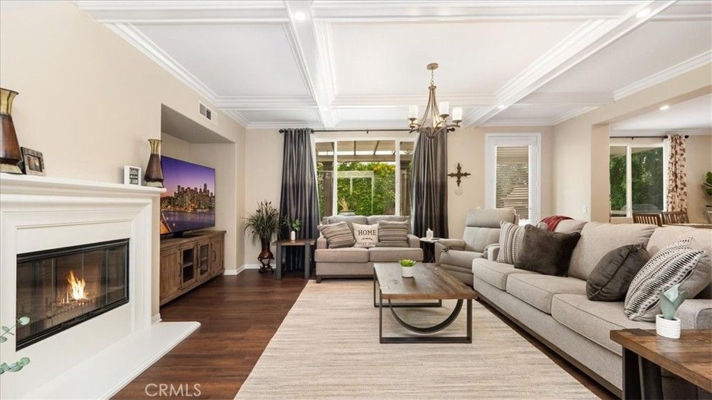 Chandelier, Fireplace, Interior, Living room, Recessed Lighting, Wood Texture Flooring