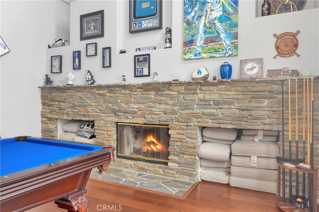 Billiard Table, Fireplace, Game Room, Interior, Stone Walls, Wood Texture Flooring
