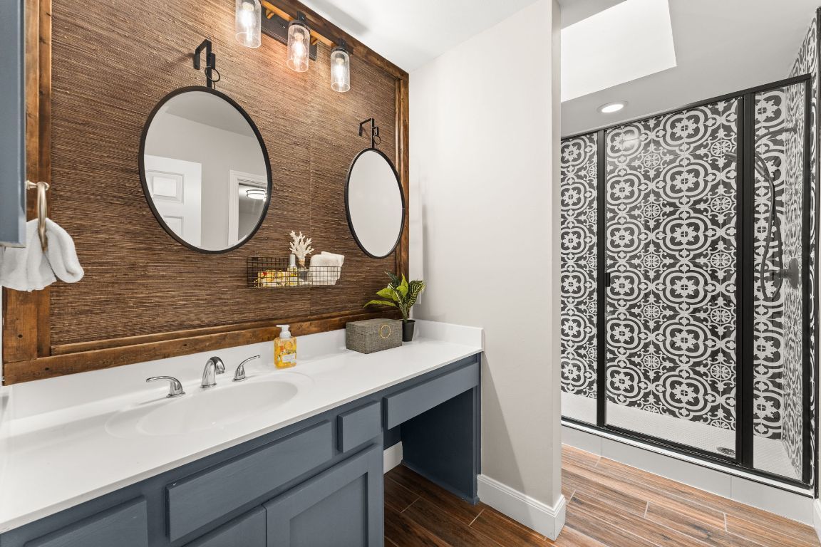 Bathroom, Dual Sink Vanities, Interior, Recessed Lighting, Wood Texture Flooring