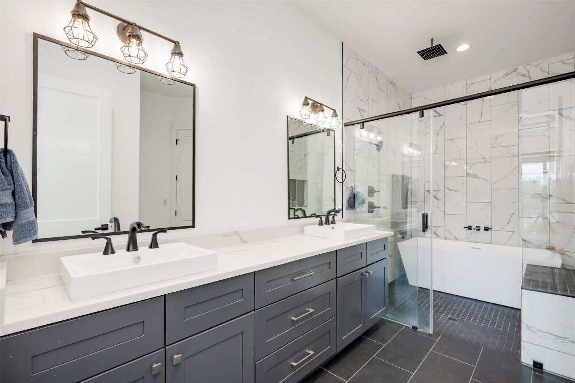 Bathroom, Dual Sink Vanities, Glass Shower, Interior, Marble Walls, Recessed Lighting