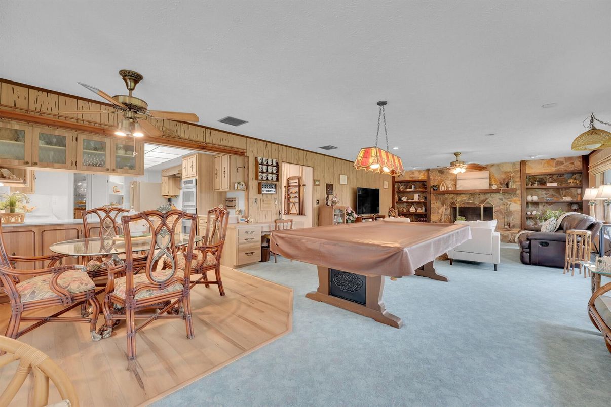 Billiard Table, Dining room, Fireplace, Game Room, Interior, Pendant Lights, Stone Walls
