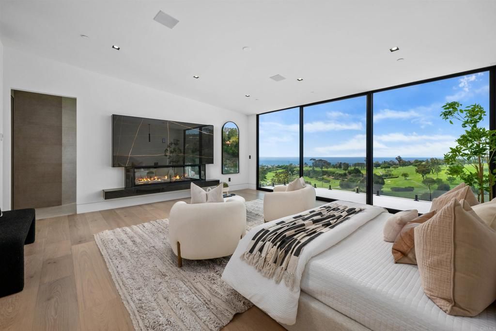 Bedroom, Fireplace, Interior, Living room, Recessed Lighting, Water, Wood Texture Flooring