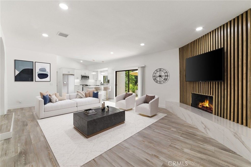 Fireplace, Interior, Kitchen, Living room, Recessed Lighting, Stainless Steel Appliances, Wood Texture Flooring