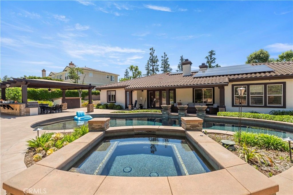 Exterior, Pool, Solar Panels
