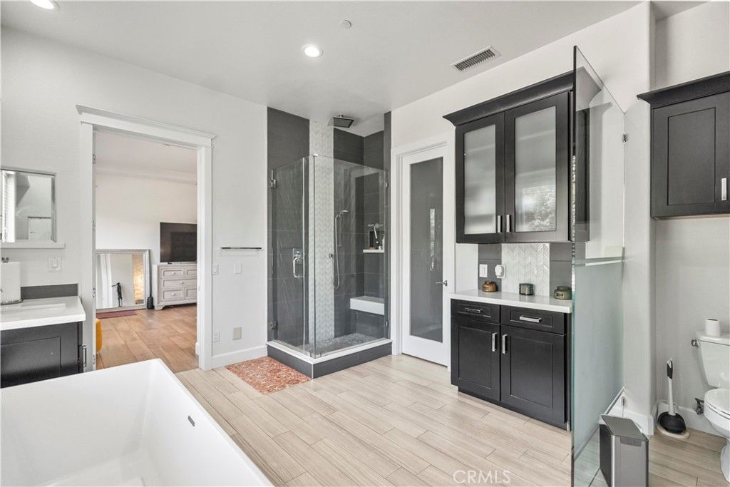 Bathroom, Glass Shower, Interior, Recessed Lighting, Wood Texture Flooring