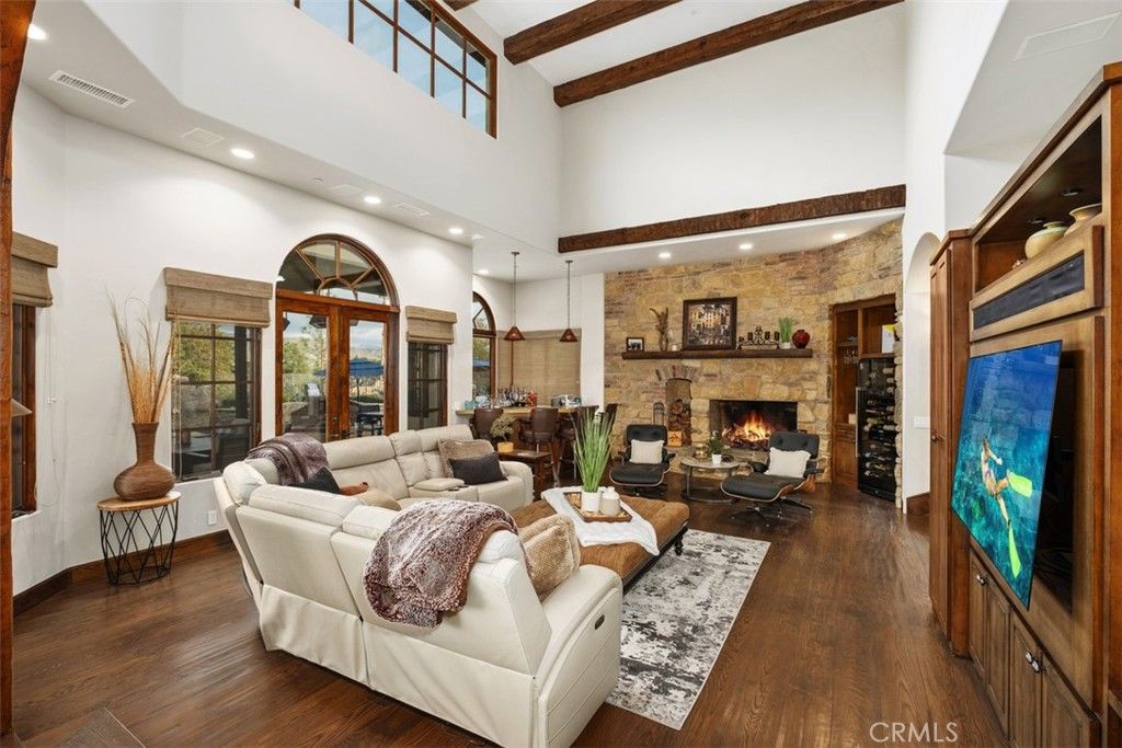 Fireplace, Interior, Living room, Pendant Lights, Recessed Lighting, Stone Walls, Wooden Beams, Wood Texture Flooring