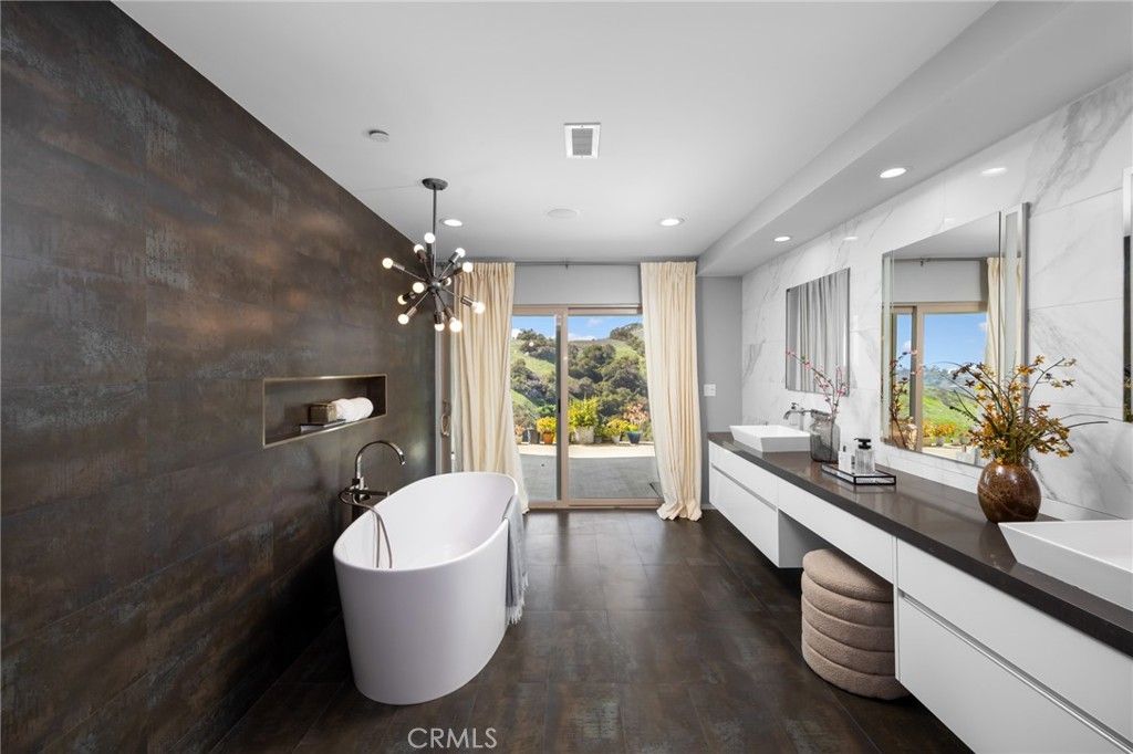 Bathroom, Dual Sink Vanities, Free Standing Baths, Interior, Marble Walls, Pendant Lights, Recessed Lighting