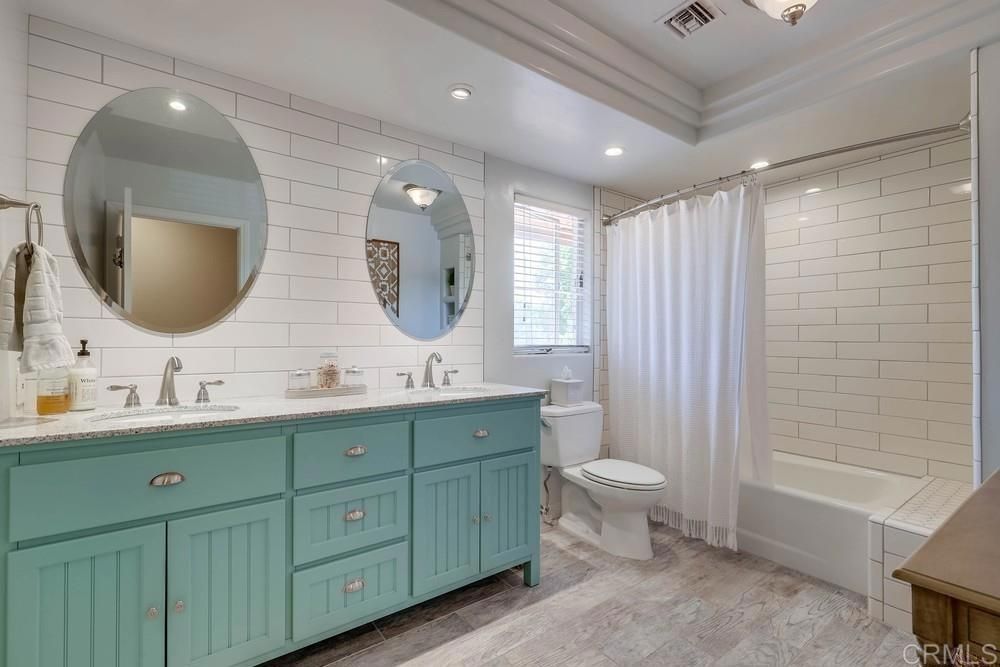 Bathroom, Dual Sink Vanities, Interior, Recessed Lighting, Wood Texture Flooring
