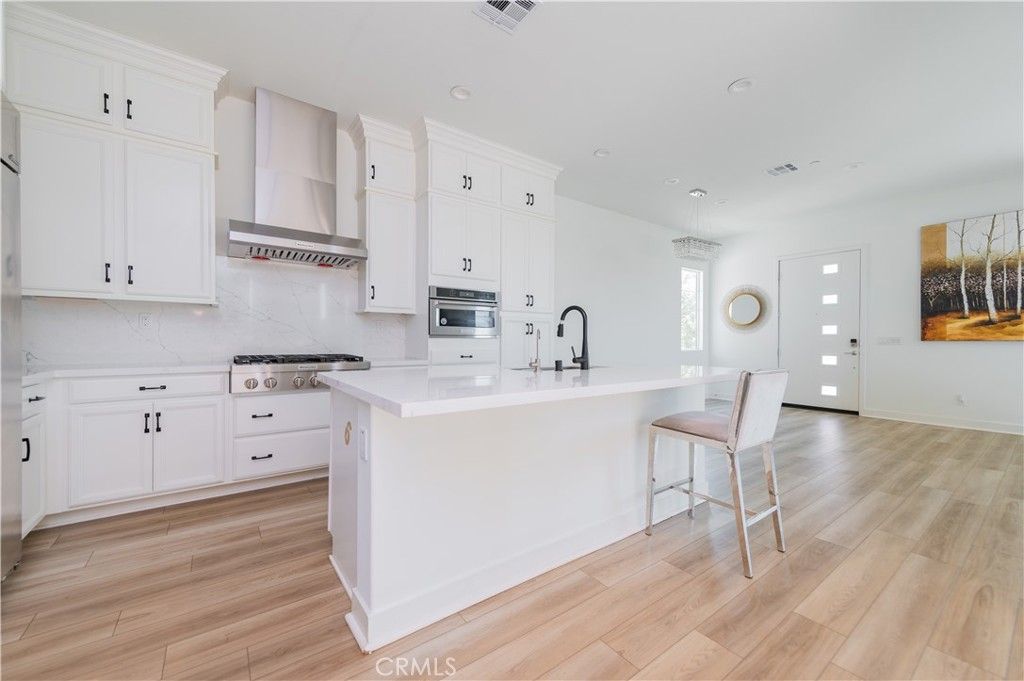 Interior, Kitchen, Marble Walls, Recessed Lighting, Wood Texture Flooring