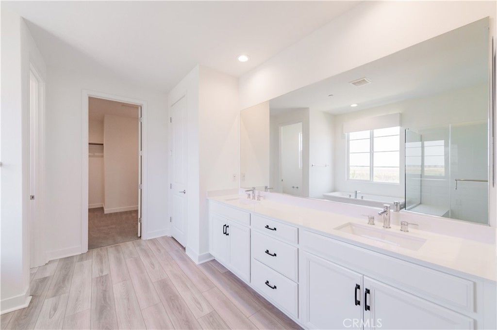 Bathroom, Dual Sink Vanities, Interior, Recessed Lighting, Wood Texture Flooring