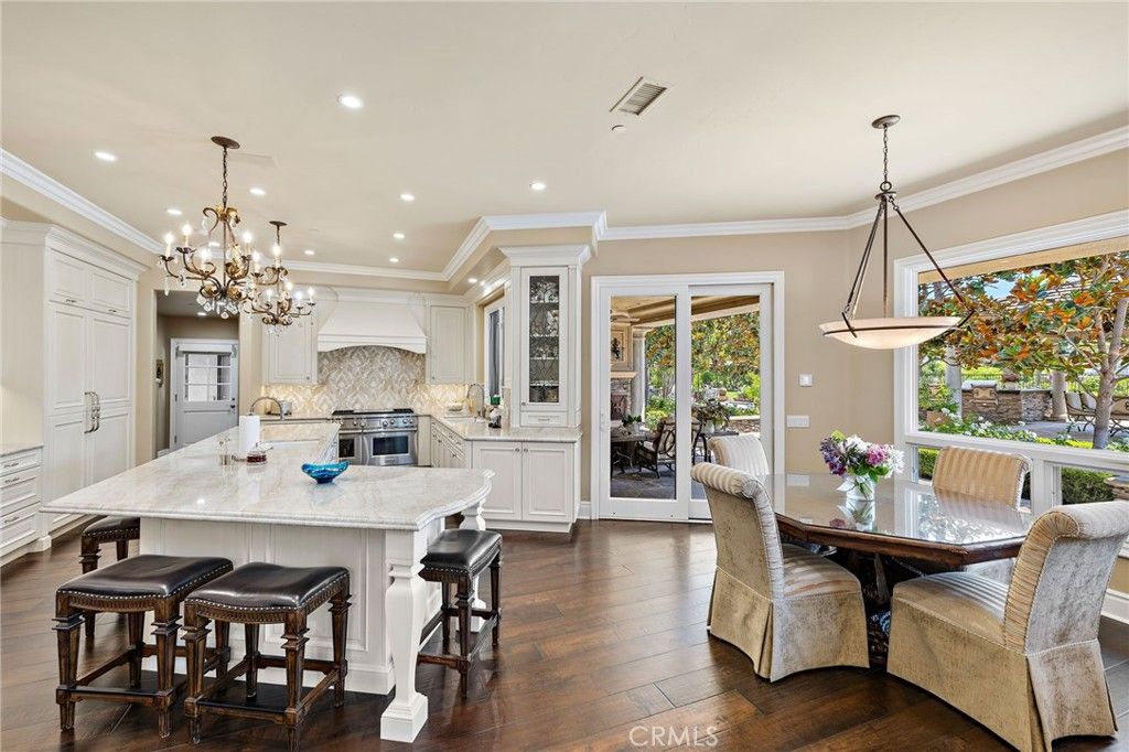 Chandelier, Dining room, Fireplace, Interior, Kitchen, Pendant Lights, Recessed Lighting, Wood Texture Flooring