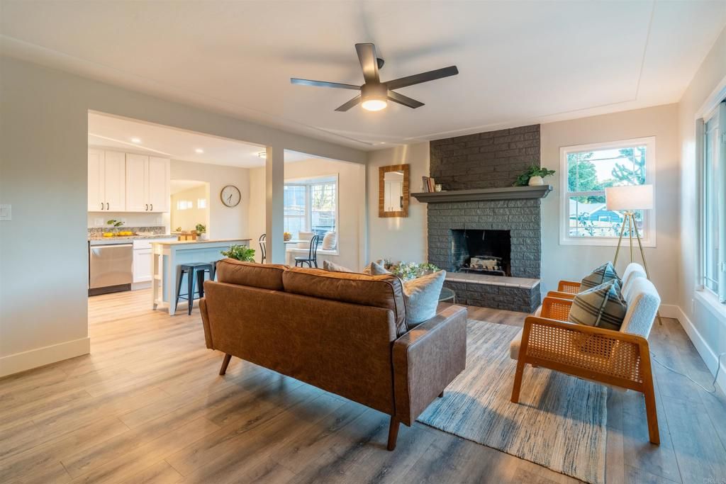 Fireplace, Interior, Kitchen, Living room, Recessed Lighting, Stone Walls, Wood Texture Flooring