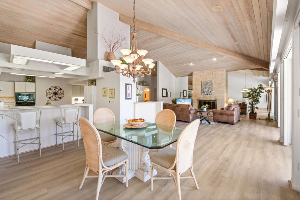 Chandelier, Dining room, Fireplace, Interior, Kitchen, Living room, Recessed Lighting, Stone Walls, Wooden Beams, Wooden Ceilings, Wood Texture Flooring