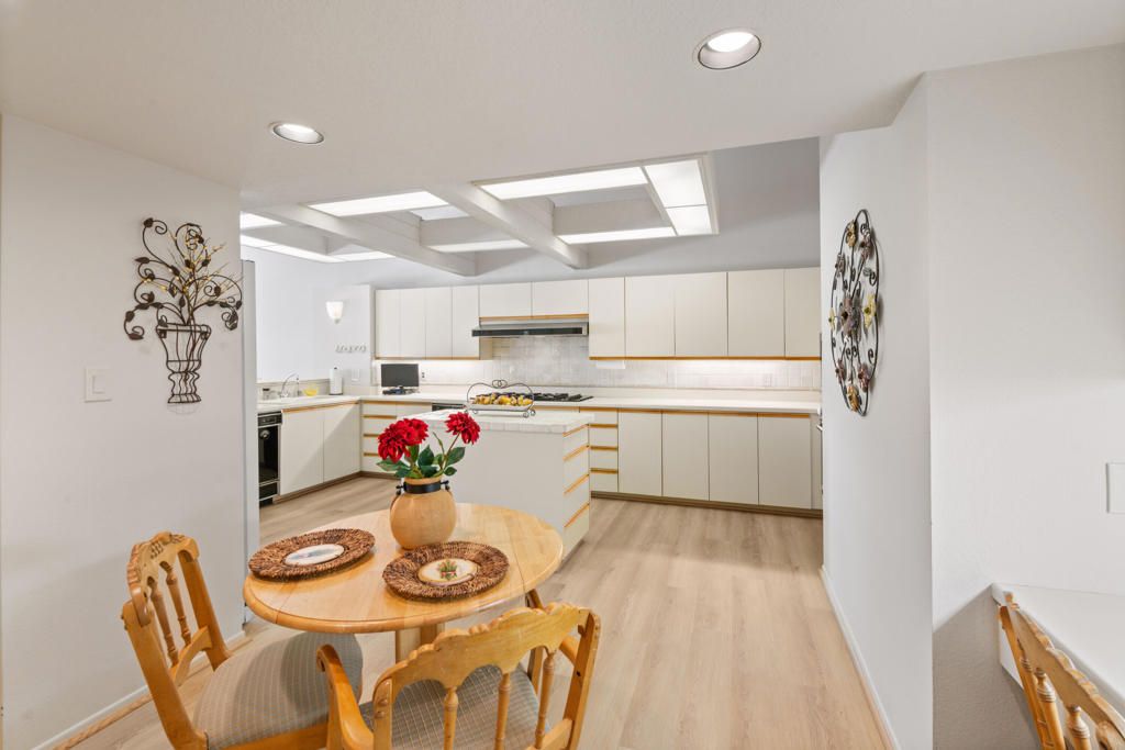 Dining room, Interior, Kitchen, Recessed Lighting, Stainless Steel Appliances, Wood Texture Flooring