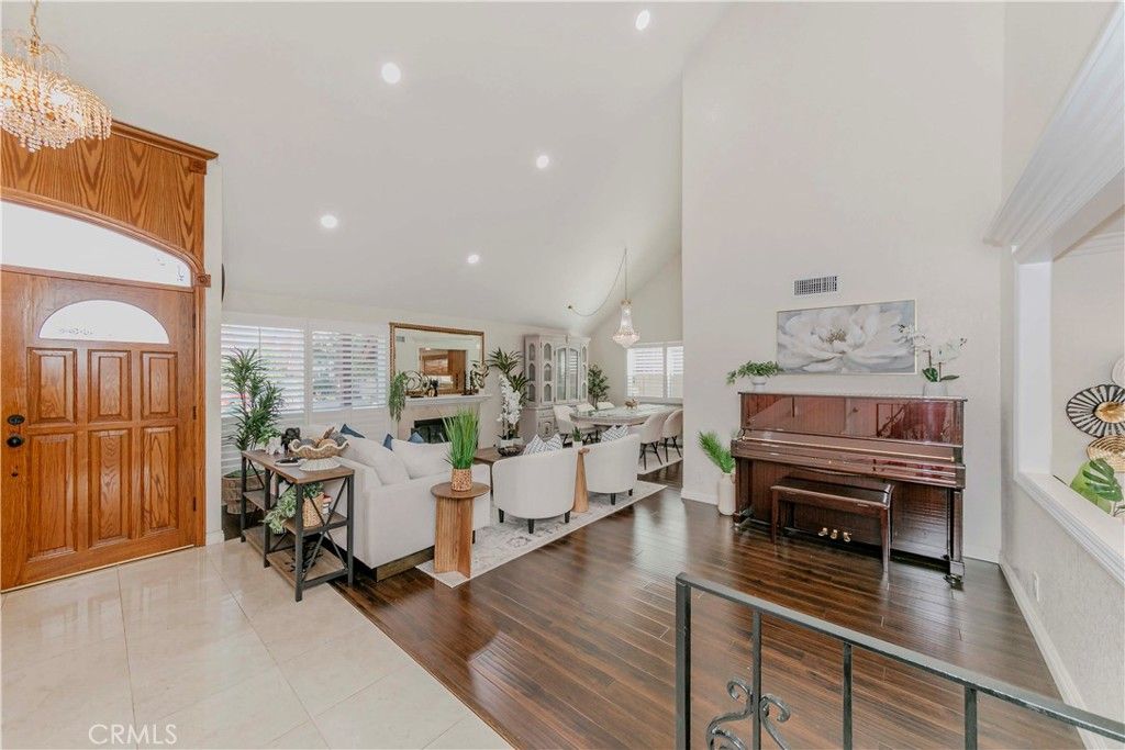 Chandelier, Interior, Living room, Piano, Recessed Lighting, Wood Texture Flooring