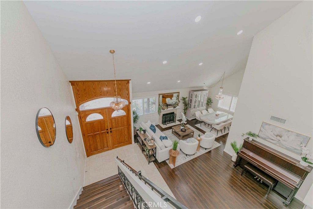 Dining room, Fireplace, Interior, Living room, Pendant Lights, Recessed Lighting, Wood Texture Flooring