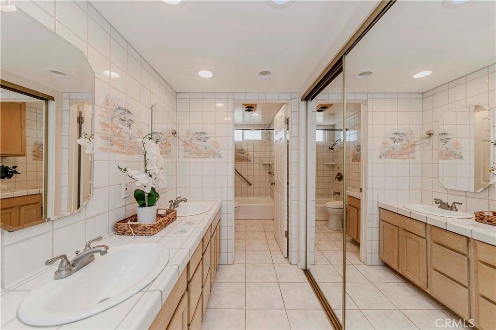 Bathroom, Dual Sink Vanities, Glass Shower, Interior, Recessed Lighting, Tile Countertops