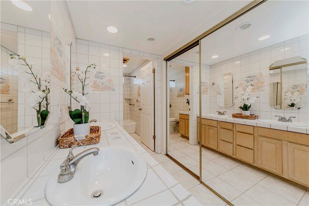 Bathroom, Dual Sink Vanities, Interior, Recessed Lighting, Tile Countertops