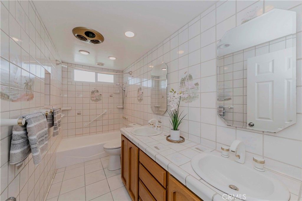 Bathroom, Dual Sink Vanities, Glass Shower, Interior, Recessed Lighting, Tile Countertops