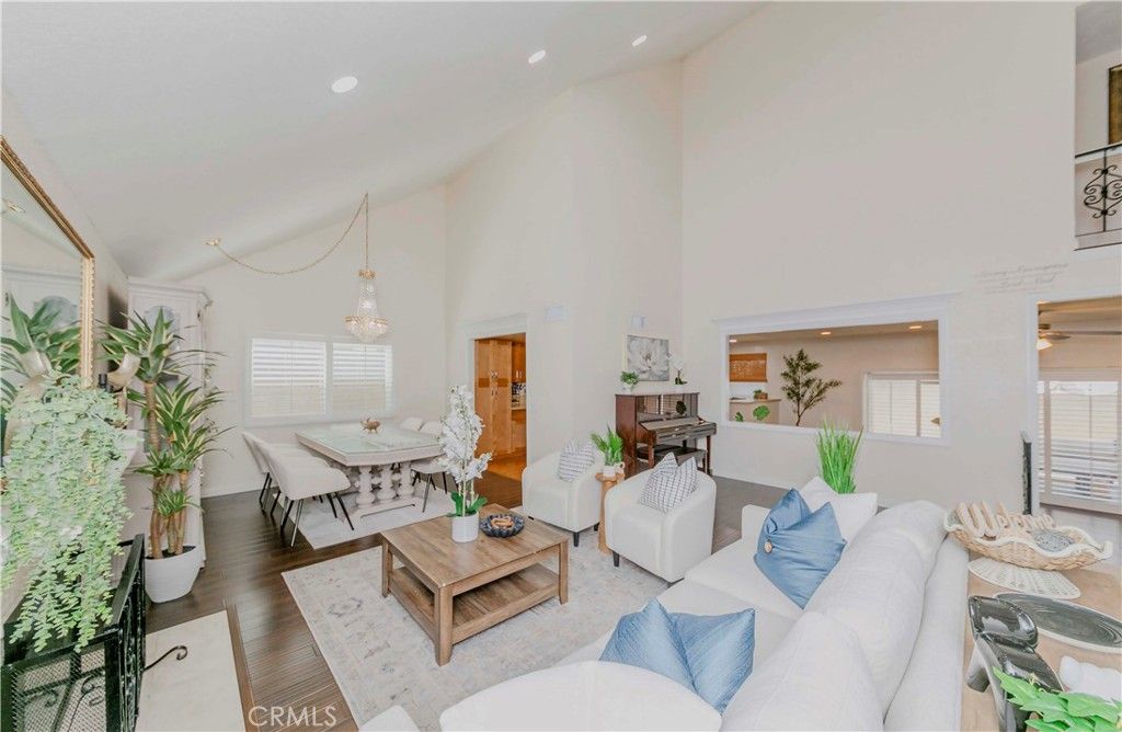 Chandelier, Dining room, Interior, Living room, Pendant Lights, Piano, Recessed Lighting, Wood Texture Flooring