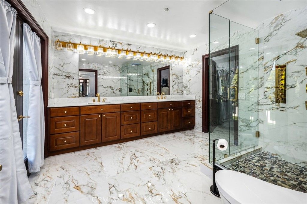 Bathroom, Dual Sink Vanities, Glass Shower, Interior, Marble, Marble Walls, Recessed Lighting