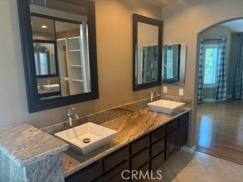 Bathroom, Dual Sink Vanities, Interior, Recessed Lighting, Wood Texture Flooring