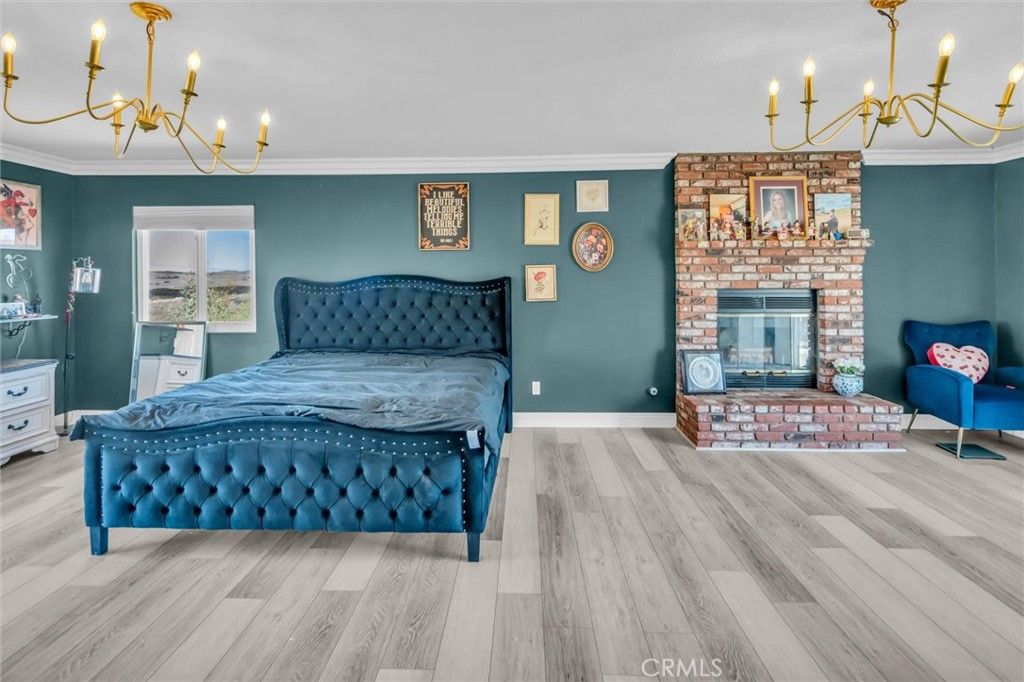 Bedroom, Chandelier, Fireplace, Interior, Wood Texture Flooring