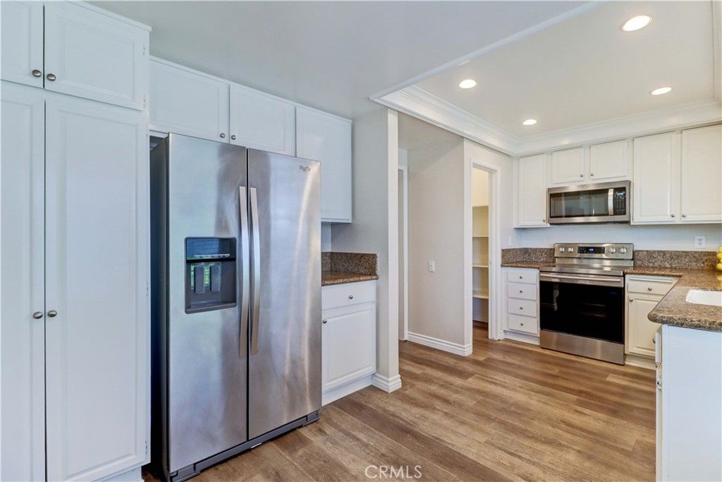 Interior, Kitchen, Recessed Lighting, Stainless Steel Appliances, Wood Texture Flooring