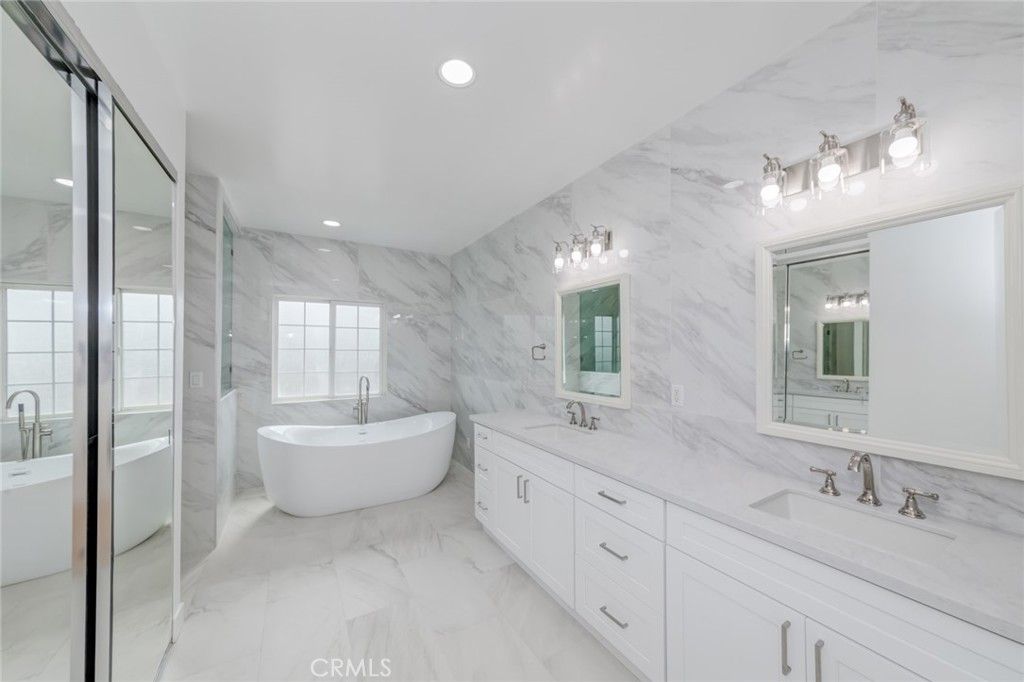 Bathroom, Dual Sink Vanities, Free Standing Baths, Glass Shower, Interior, Marble, Marble Walls, Recessed Lighting