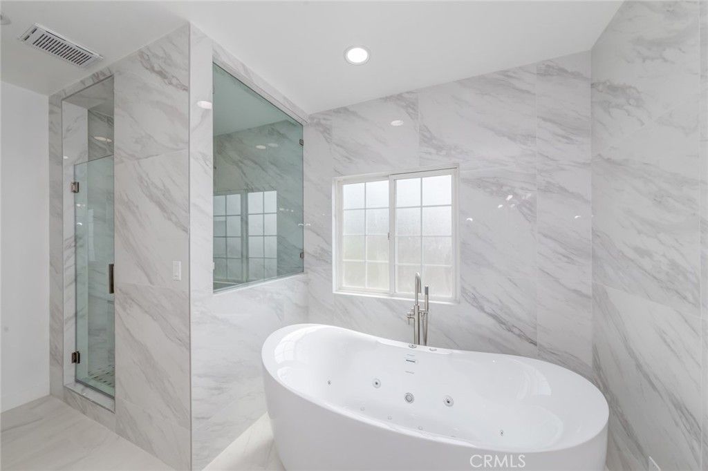 Bathroom, Free Standing Baths, Glass Shower, Interior, Marble Walls, Recessed Lighting