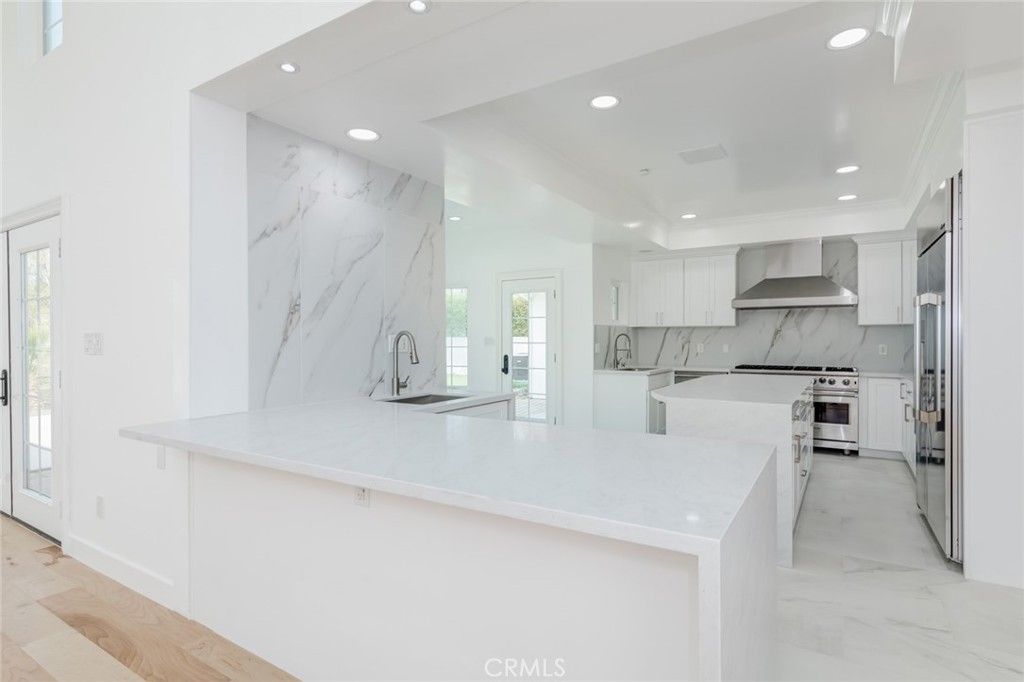 Interior, Kitchen, Marble, Marble Walls, Recessed Lighting, Stainless Steel Appliances