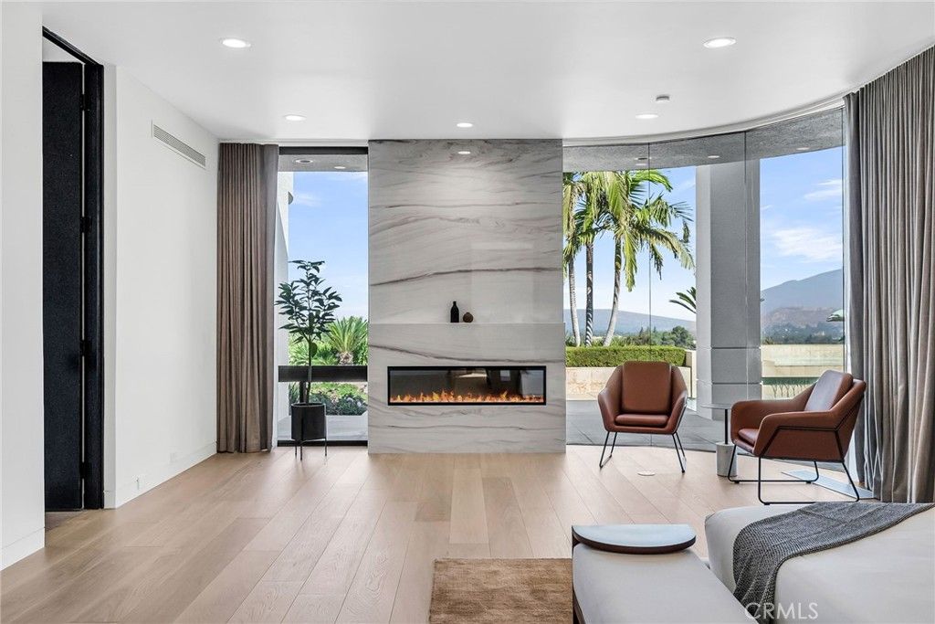 Fireplace, Interior, Living room, Marble Walls, Recessed Lighting, Wood Texture Flooring