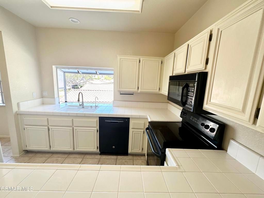 Interior, Kitchen, Recessed Lighting, Tile Countertops