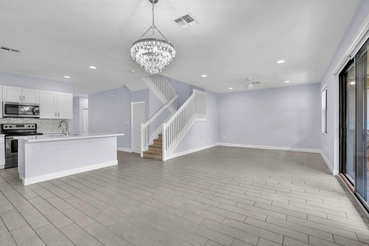Chandelier, Interior, Kitchen, Recessed Lighting, Stainless Steel Appliances, Wood Texture Flooring